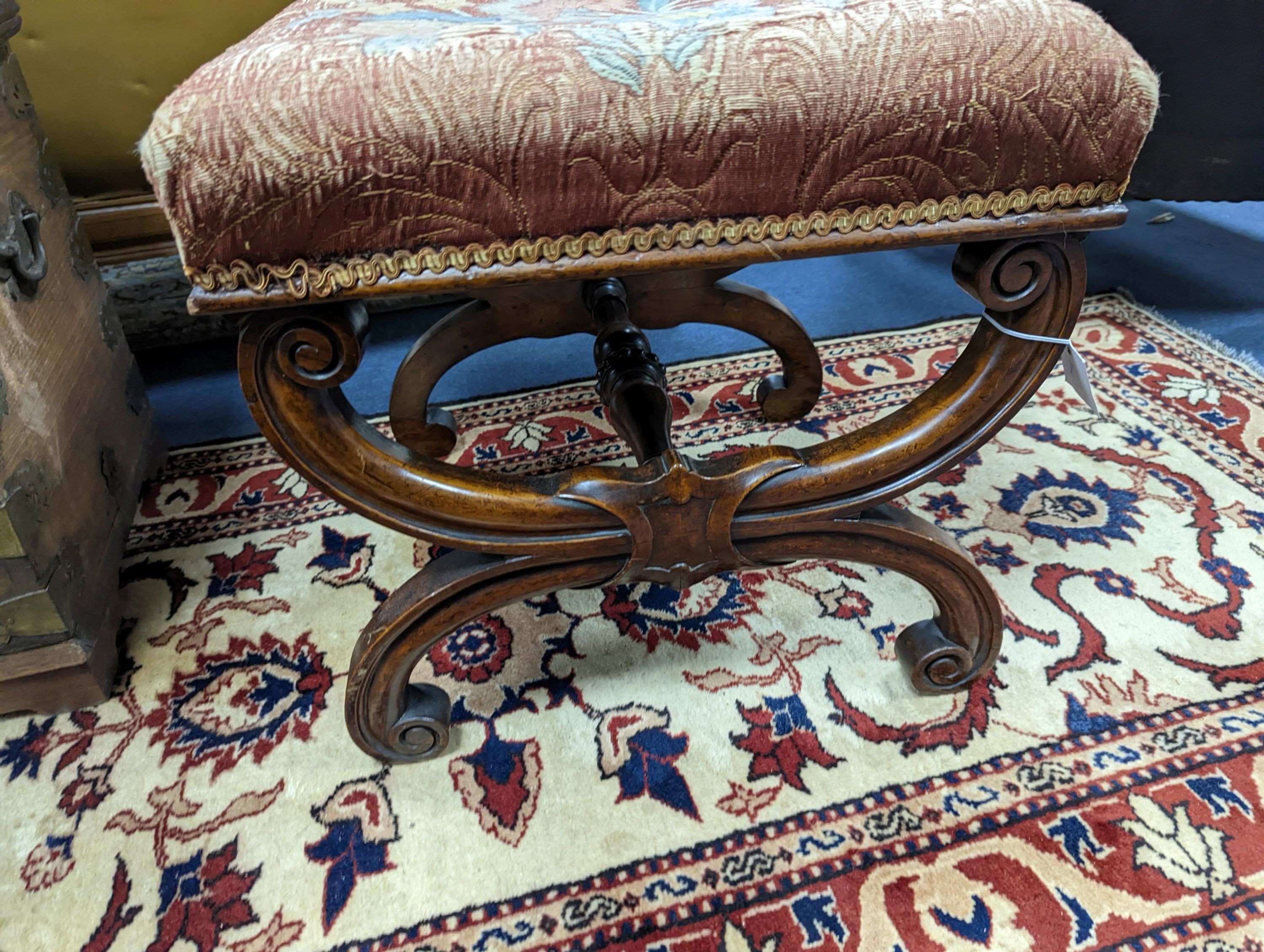 An early Victorian mahogany X frame dressing stool, length 46cm, depth 45cm, height 42cm